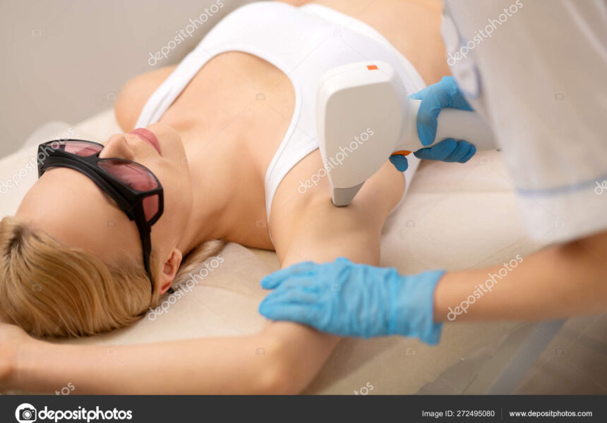 Under arms. Blonde client wearing protective glasses having laser depilation under arms SSUCv3H4sIAAAAAAAEAJ2SS27DIBCG95V6B4t1kGyD7dCrVF0MMI5RCEQYt4qi3L34QcW6O+ab1z8zPN/fqopImI0iH9VztZJtrF3mGCAa7xKuTwcP6DSGkqA20QcDtoQSopoc3DBBt1i74tfmJHOEuMw4r80OpCDiJdXY4V+JXdHnblfZsTlTRnIRcirYvMiNZfQ6/Ttzf3zlaeCCTj02wcUgAS3CPsihkbSN4Odx4HQYUFIugVHBG0a7mveyGbuO6TF3JqyRSjXAqeyHFNzpmgrAliroeF0rzhnHTdKug1x/IoZbuTdYtPHFyr69ArsGsELmPRhl3KVI83HaTpjTlF9cDI9yLcR6fwdp1/uNqSZmPsE8p3CdedFIpQ/jb0Uf5+O2naMq0enMq9mwtm7Pou94L7pB9OxM8tfw6mp0OeL+WyaTXOFRcLMqIEMvRt7ygTZSpBVq3VCoGdIOYOQDCIYjSyt8/QIAtSIK5AIAAA==